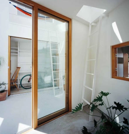 Aluminum-Clad Wood Sliding Doors vs Solid Wood Sliding Doors